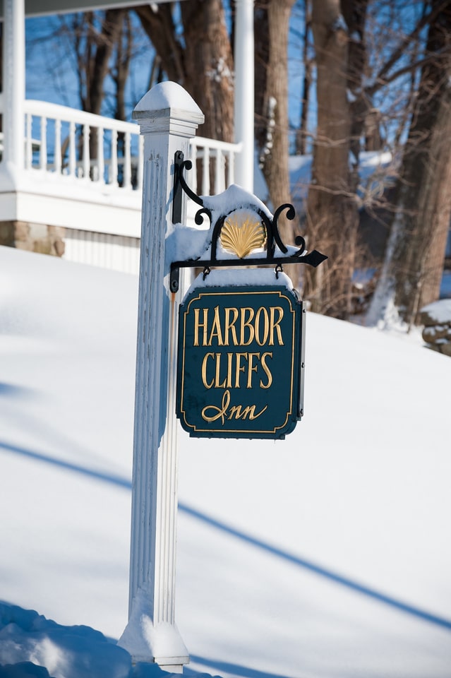 Harbor Cliffs Inn sign winter